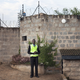 Sebastian. Security guard. Guarding a house in one of the wealthier areas of Nairobi.